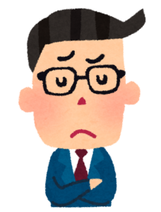 目を閉じて考えている男性の顔